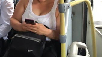 Milf'S Bouncing Breasts On The Bus