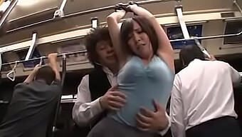 A Japanese Couple Engages In Sexual Activity On A Bus