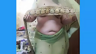 Mature Indian Milf Teases Her Young Lover In A Net Saree Video